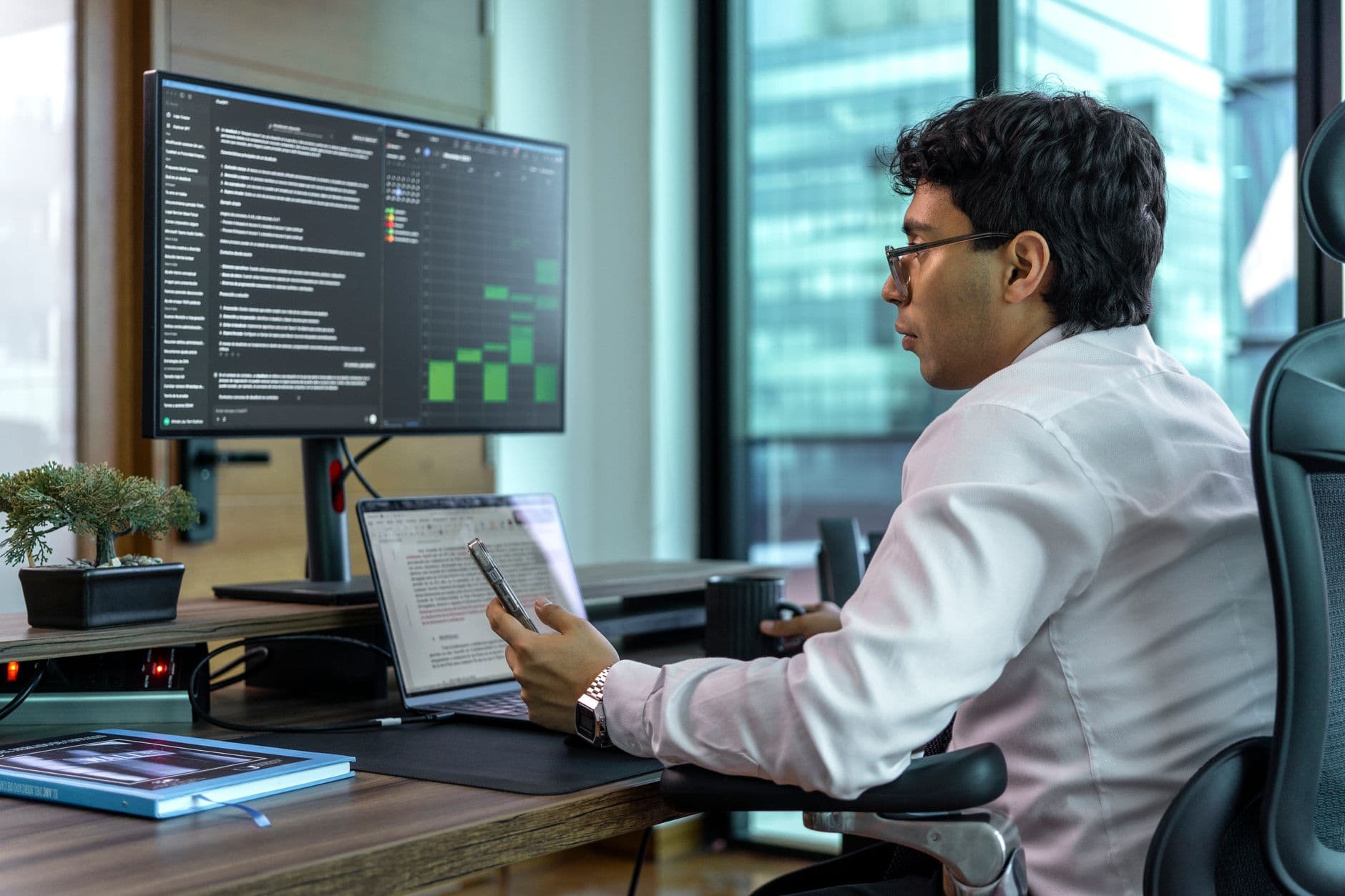 A tidy office desk with two computer monitors