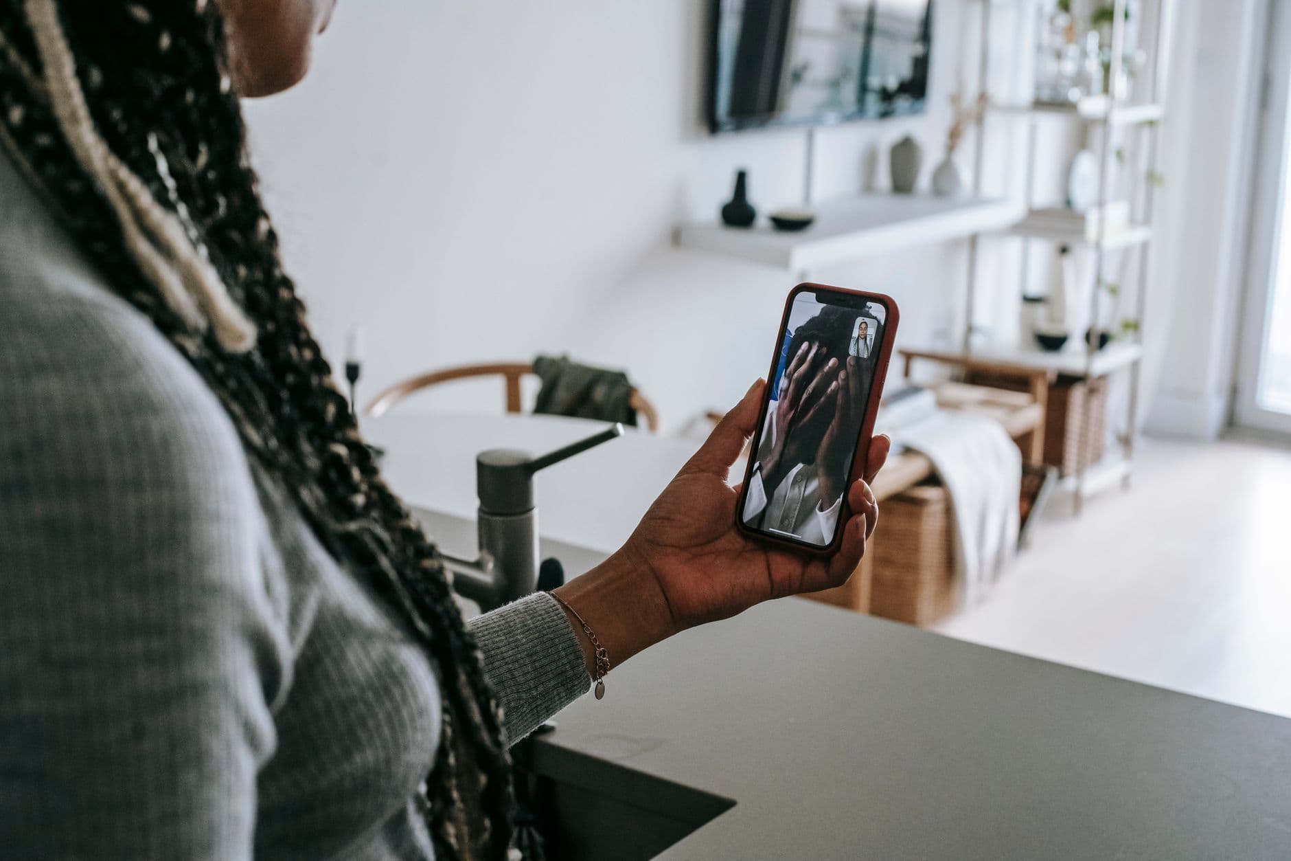 A phone screen showing a full-screen incoming call alert